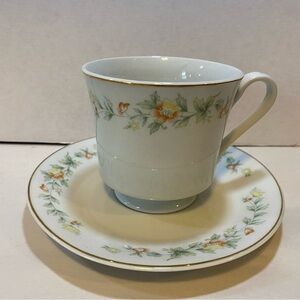 White floral with gold trim teacup‎ and saucer